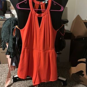 Bright orange romper that was only worn once!